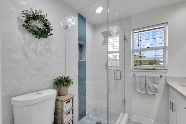 3110 Kingston Ct, West Palm Beach, FL 33409 - bathroom with a shower stall, vanity, and toilet