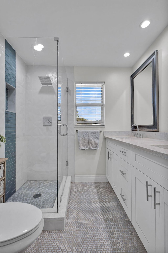 3110 Kingston Ct, West Palm Beach, FL 33409 - full bathroom with a stall shower, tile patterned floors, vanity, toilet, and recessed lighting