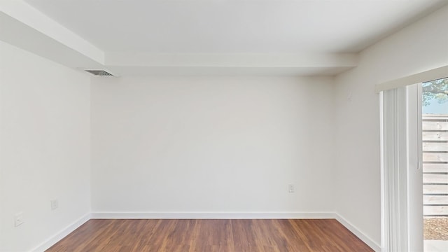 615 6th Ter, Palm Beach Gardens, FL 33418 - empty room featuring dark wood-style flooring and baseboards