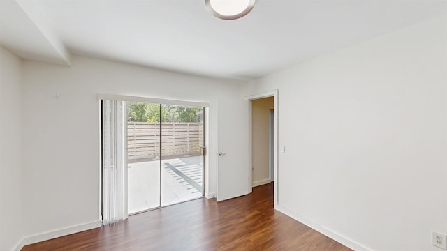 615 6th Ter, Palm Beach Gardens, FL 33418 - unfurnished room featuring wood finished floors and baseboards