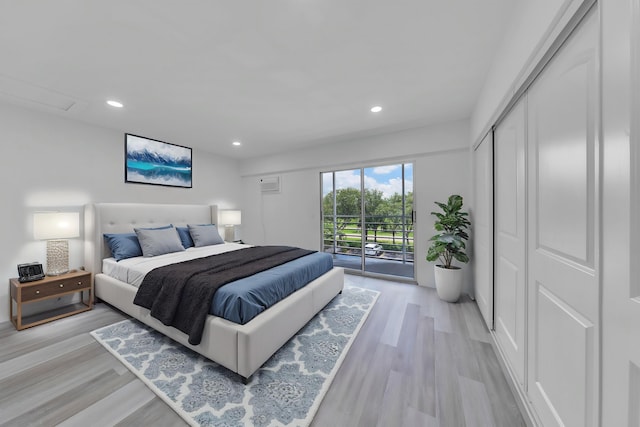 76 Mansfield B 76, Boca Raton, FL 33434 - bedroom with light wood finished floors, access to exterior, recessed lighting, and a closet