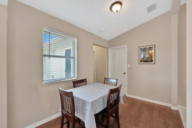 5472 Courtney Cir, Boynton Beach, FL 33472 - dining room with dark wood finished floors, vaulted ceiling, and baseboards