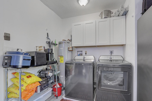 6691 SE Raintree Ave, Stuart, FL 34997 - laundry room featuring cabinet space, washing machine and dryer, and water heater