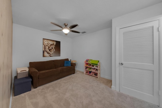 4099 Palm Bay Cir Unit A, West Palm Beach, FL 33406 - living area featuring a ceiling fan, carpet, and baseboards