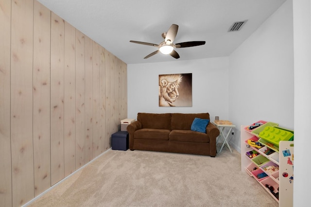 4099 Palm Bay Cir Unit A, West Palm Beach, FL 33406 - recreation room featuring carpet floors, ceiling fan, and wood walls