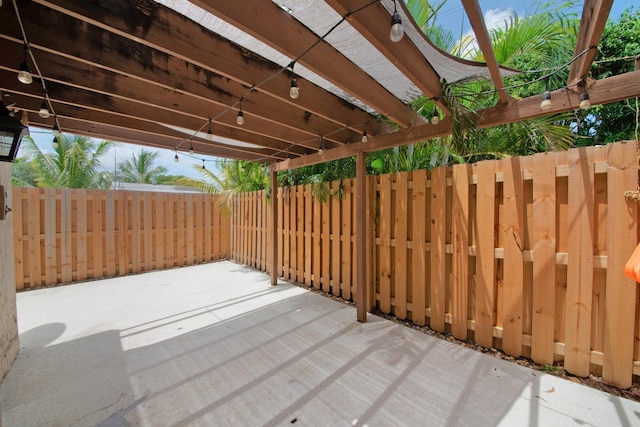 4099 Palm Bay Cir Unit A, West Palm Beach, FL 33406 - fenced backyard with a patio area