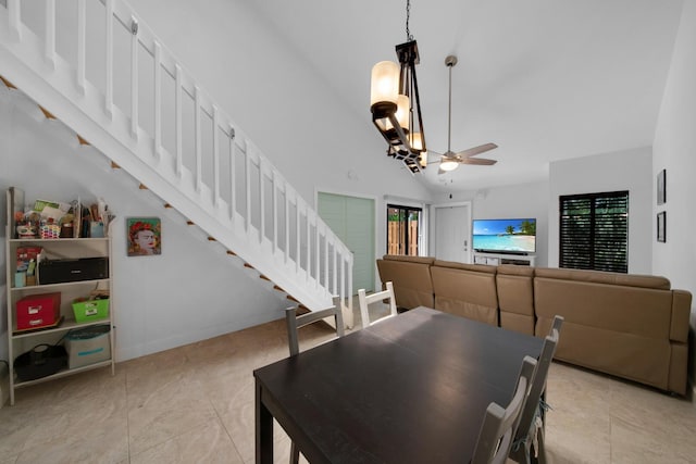 4099 Palm Bay Cir Unit A, West Palm Beach, FL 33406 - dining area with a ceiling fan, stairway, vaulted ceiling, and light tile patterned floors