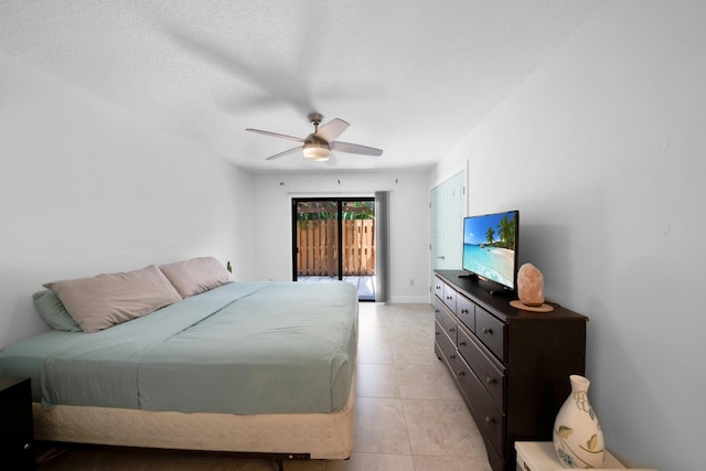 4099 Palm Bay Cir Unit A, West Palm Beach, FL 33406 - bedroom featuring a ceiling fan, light tile patterned floors, access to exterior, and baseboards