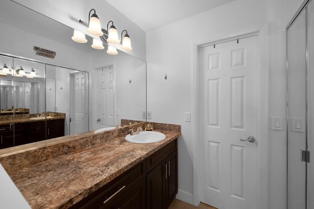 4099 Palm Bay Cir Unit A, West Palm Beach, FL 33406 - bathroom featuring vanity, a closet, and baseboards