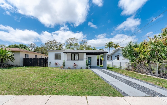 200 SW 48th Ave, Miami, FL 33134 - view of front facade featuring concrete driveway, a carport, and stucco siding