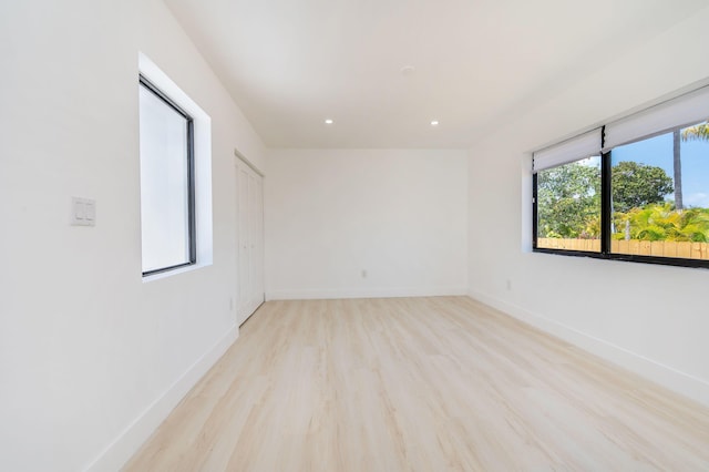 200 SW 48th Ave, Miami, FL 33134 - unfurnished room featuring light wood-type flooring, baseboards, and recessed lighting