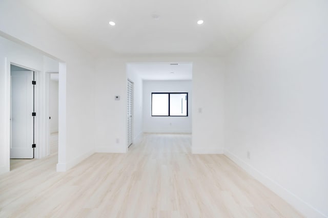 200 SW 48th Ave, Miami, FL 33134 - unfurnished room with light wood-style floors, baseboards, and recessed lighting