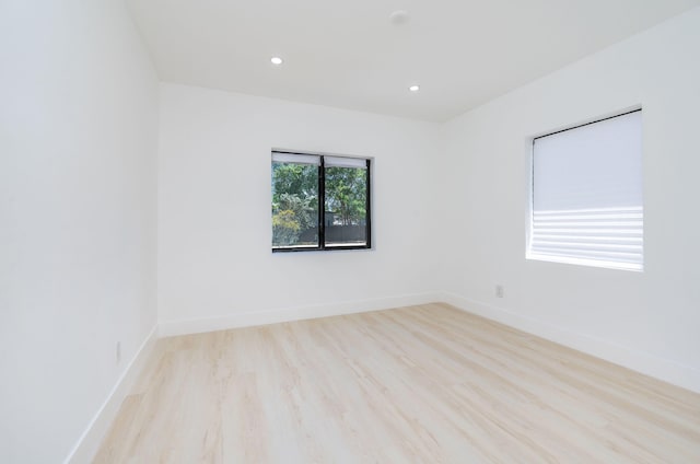 200 SW 48th Ave, Miami, FL 33134 - empty room featuring wood finished floors, recessed lighting, and baseboards