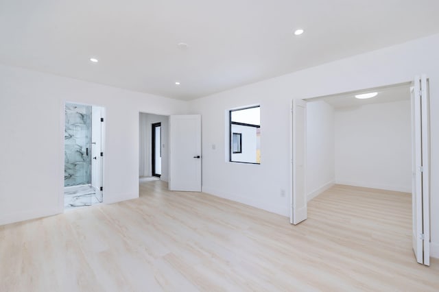 200 SW 48th Ave, Miami, FL 33134 - spare room featuring light wood-style flooring, recessed lighting, and baseboards