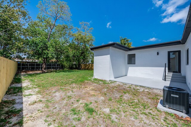200 SW 48th Ave, Miami, FL 33134 - fenced backyard featuring cooling unit and entry steps