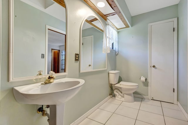 102 SE Crosspoint Dr, Port Saint Lucie, FL 34983 - bathroom featuring toilet, baseboards, and tile patterned flooring