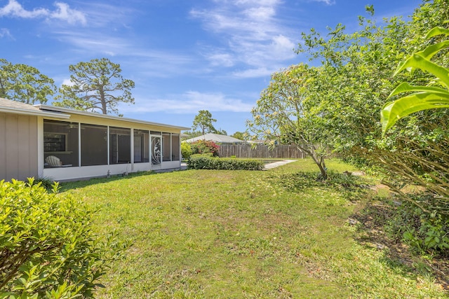 102 SE Crosspoint Dr, Port Saint Lucie, FL 34983 - view of yard with a sunroom