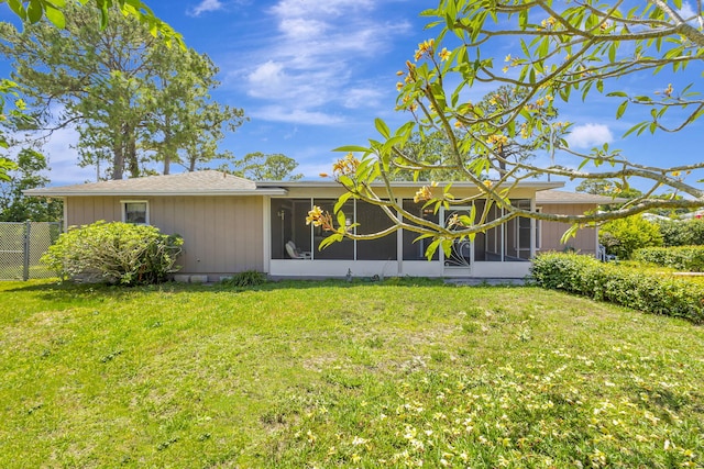 102 SE Crosspoint Dr, Port Saint Lucie, FL 34983 - back of house with a sunroom