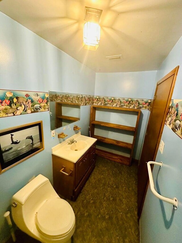 15255 NW 260th St, Okeechobee, FL 34972 - bathroom featuring vanity and toilet