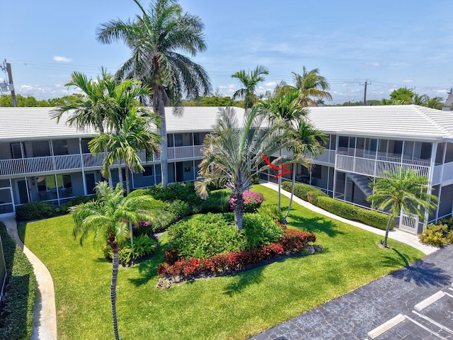 426 NE 7th Ave Unit 1F, Delray Beach, FL 33483 - view of property featuring uncovered parking