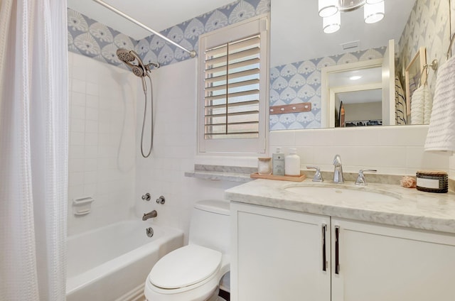 426 NE 7th Ave Unit 1F, Delray Beach, FL 33483 - full bathroom with wallpapered walls, shower / tub combo with curtain, vanity, toilet, and tile walls