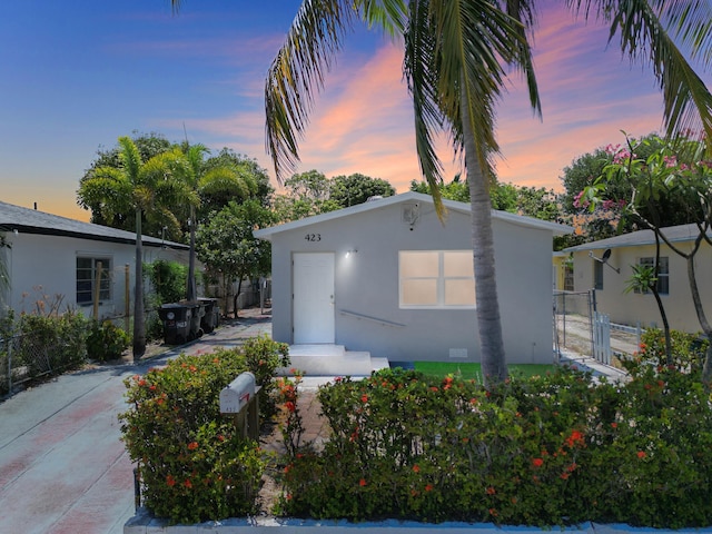 423 N F St, Lake Worth Beach, FL 33460 - view of front of house with stucco siding