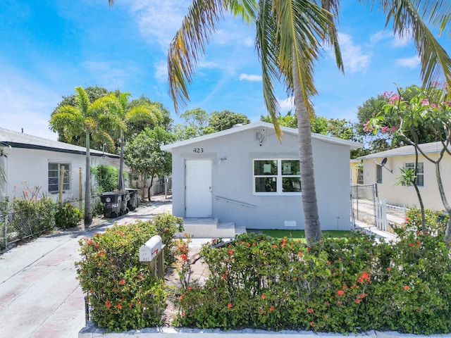 423 N F St, Lake Worth Beach, FL 33460 - view of front of house with stucco siding