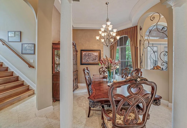 1885 Via Bellezza, Wellington, FL 33411 - tiled dining room with decorative columns, a chandelier, arched walkways, crown molding, and stairs