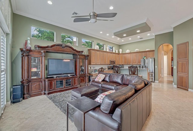 1885 Via Bellezza, Wellington, FL 33411 - living area featuring ceiling fan, arched walkways, crown molding, recessed lighting, and baseboards