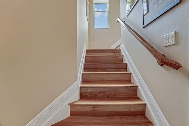 1885 Via Bellezza, Wellington, FL 33411 - staircase with wood finished floors