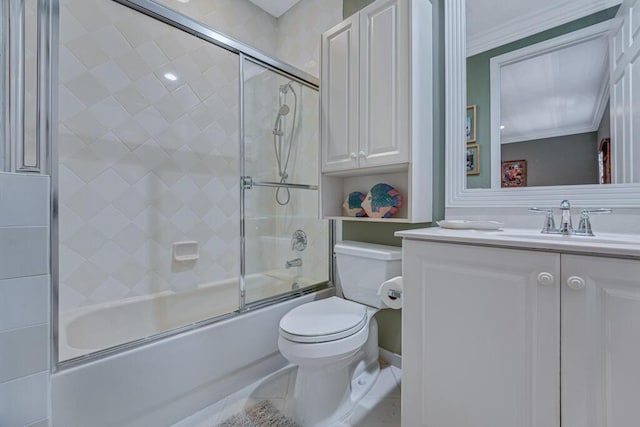 1885 Via Bellezza, Wellington, FL 33411 - bathroom with toilet, crown molding, vanity, and shower / bath combination with glass door