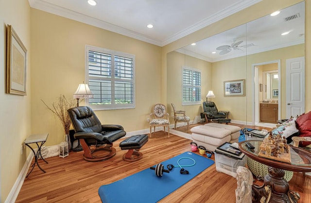 1885 Via Bellezza, Wellington, FL 33411 - living room with wood finished floors, healthy amount of natural light, recessed lighting, baseboards, and ornamental molding