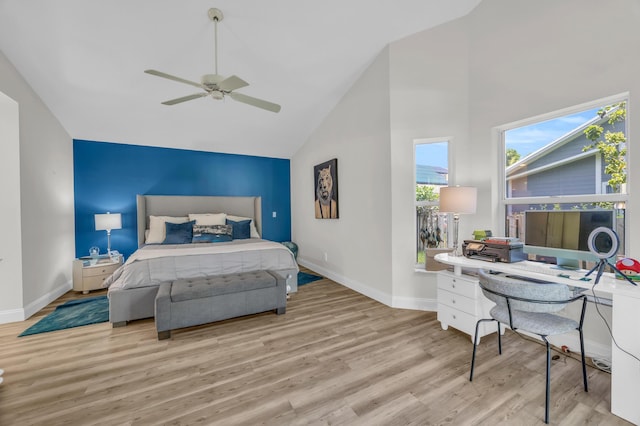 6304 SE Ames Way, Hobe Sound, FL 33455 - bedroom featuring wood finished floors, baseboards, high vaulted ceiling, ceiling fan, and a desk