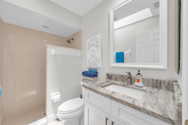 6304 SE Ames Way, Hobe Sound, FL 33455 - bathroom with a shower stall, vanity, and toilet