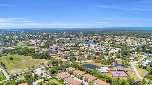 6304 SE Ames Way, Hobe Sound, FL 33455 - aerial view of property and surrounding area with a nearby body of water and nearby suburban area