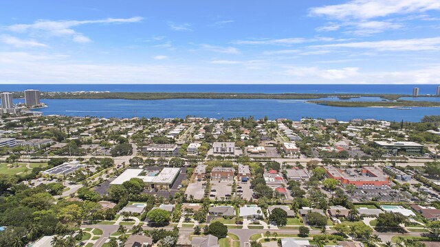 744 Eastwind Dr, North Palm Beach, FL 33408 - aerial view of property and surrounding area with a nearby body of water and nearby suburban area