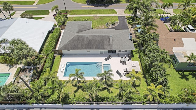 744 Eastwind Dr, North Palm Beach, FL 33408 - view of subject property with a pool area