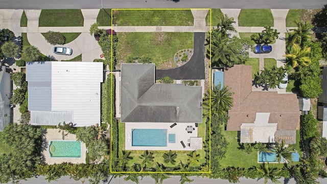 744 Eastwind Dr, North Palm Beach, FL 33408 - aerial view of property and surrounding area with a pool and property boundaries highlighted