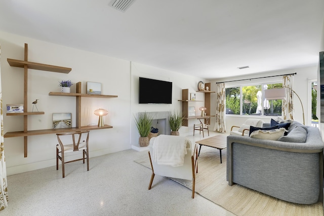 744 Eastwind Dr, North Palm Beach, FL 33408 - living area featuring speckle patterned floor