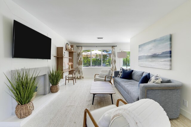 744 Eastwind Dr, North Palm Beach, FL 33408 - living room with baseboards