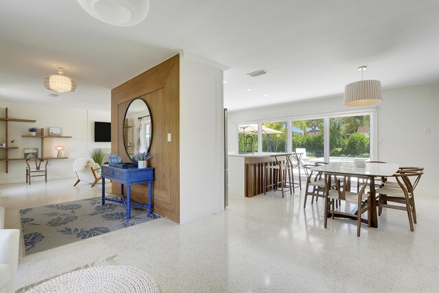 744 Eastwind Dr, North Palm Beach, FL 33408 - dining space with speckled floor