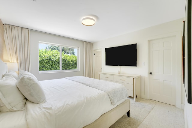 744 Eastwind Dr, North Palm Beach, FL 33408 - bedroom featuring dark speckled floor