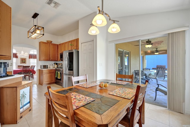 5940 NW Center St, Port Saint Lucie, FL 34986 - dining room featuring light tile patterned flooring, plenty of natural light, and a ceiling fan
