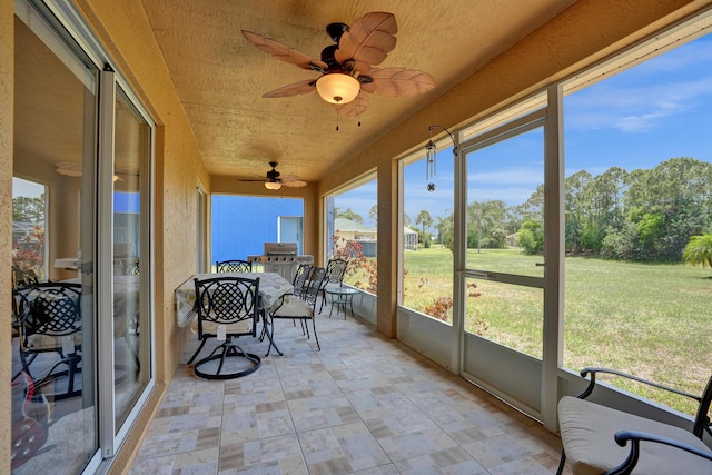 5940 NW Center St, Port Saint Lucie, FL 34986 - sunroom with a ceiling fan
