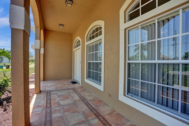 5940 NW Center St, Port Saint Lucie, FL 34986 - view of covered porch