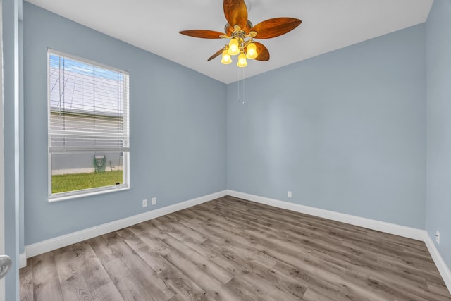 198 Magnolia Lakes Blvd, Port Saint Lucie, FL 34986 - spare room featuring baseboards, wood finished floors, and a ceiling fan