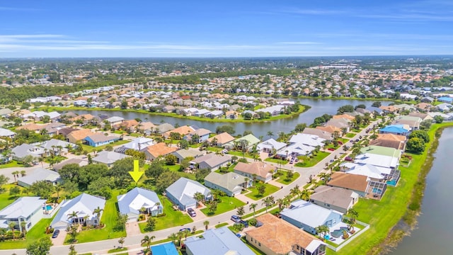 198 Magnolia Lakes Blvd, Port Saint Lucie, FL 34986 - aerial perspective of suburban area with a large body of water