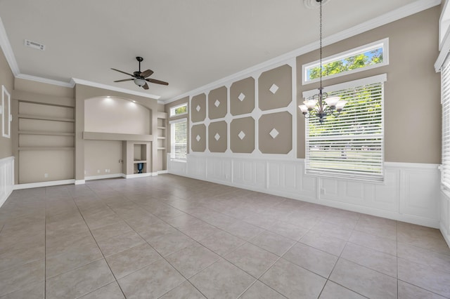 198 Magnolia Lakes Blvd, Port Saint Lucie, FL 34986 - unfurnished living room with built in features, a chandelier, light tile patterned flooring, ceiling fan, and crown molding