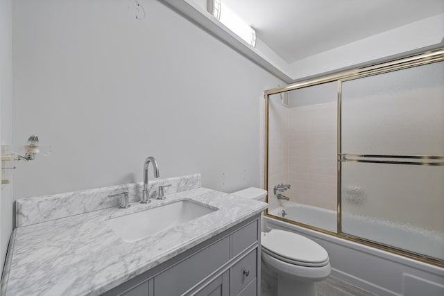 2950 SE Ocean Blvd Unit 9-5, Stuart, FL 34996 - full bath with toilet, enclosed tub / shower combo, and vanity