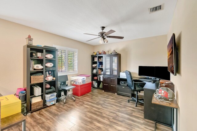 5014 Manchia Dr, Lake Worth, FL 33463 - office area featuring a ceiling fan and wood finished floors